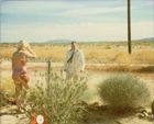 Camille and Bob by the Fence (Wonder Valley), 2006